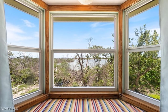 unfurnished sunroom with plenty of natural light
