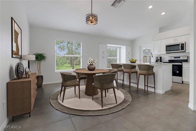 3340 33rd Ave NE, Naples, FL 34120 - dining area featuring baseboards, visible vents, recessed lighting, and light tile patterned floors
