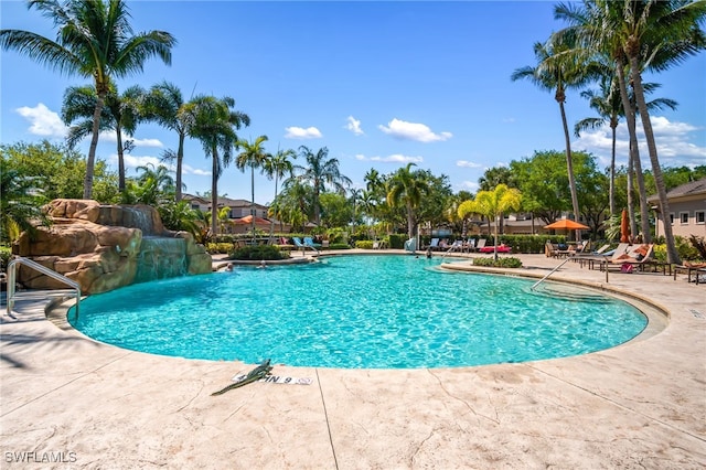 pool with a patio area