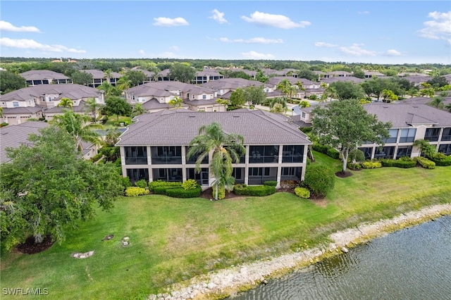 bird's eye view with a water view and a residential view