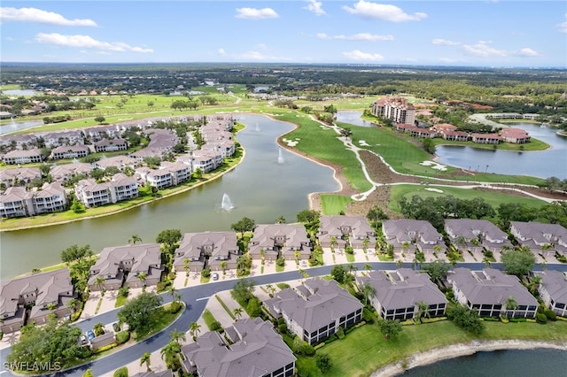 birds eye view of property featuring a water view, a residential view, and golf course view