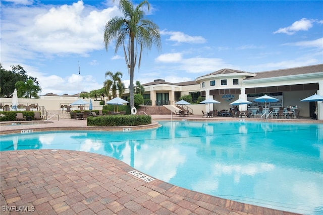community pool with a patio