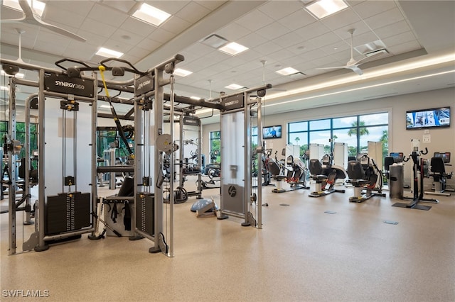 gym with a drop ceiling and visible vents