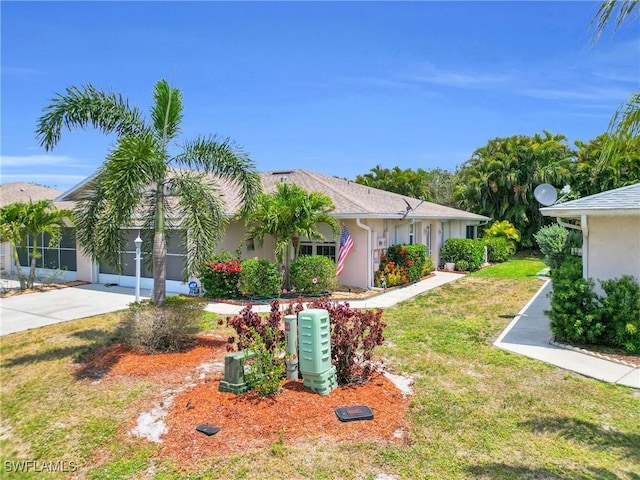 534 Bethany Village Cir, Lehigh Acres, FL 33936 - view of front of home featuring a front yard and stucco siding