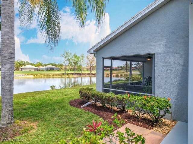 view of yard with a water view