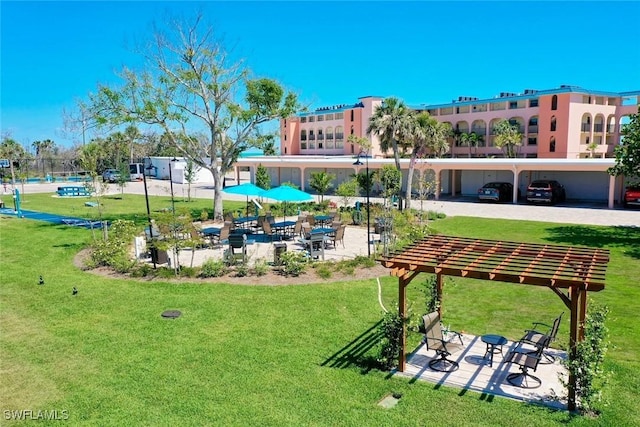 2230 Camino Del Mar Dr Unit 1C4, Sanibel, FL 33957 - view of property's community featuring a yard