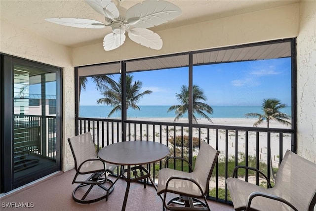 2230 Camino Del Mar Dr Unit 1C4, Sanibel, FL 33957 - sunroom / solarium with a beach view and a water view