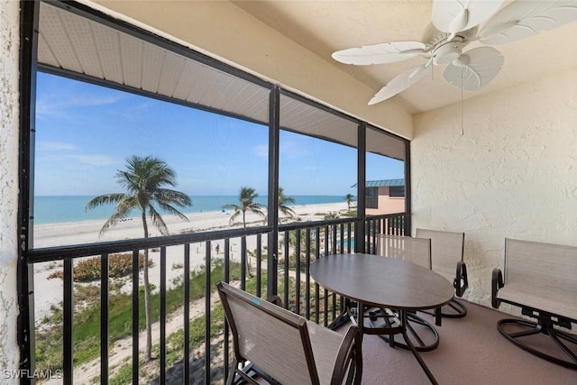2230 Camino Del Mar Dr Unit 1C4, Sanibel, FL 33957 - sunroom with a view of the beach