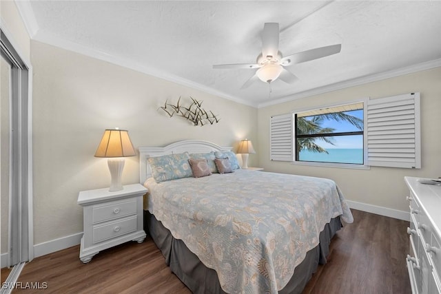 2230 Camino Del Mar Dr Unit 1C4, Sanibel, FL 33957 - bedroom with a ceiling fan, baseboards, dark wood-type flooring, and ornamental molding