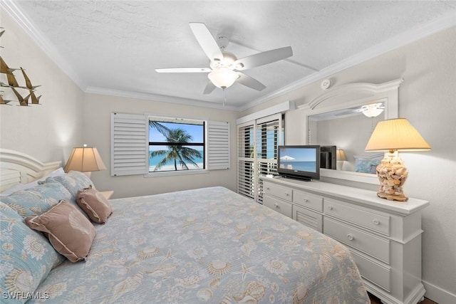 2230 Camino Del Mar Dr Unit 1C4, Sanibel, FL 33957 - bedroom with ceiling fan, ornamental molding, and a textured ceiling