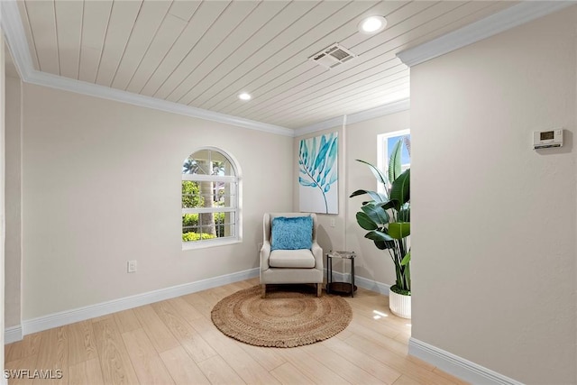 sitting room with ornamental molding, recessed lighting, baseboards, wood finished floors, and wooden ceiling
