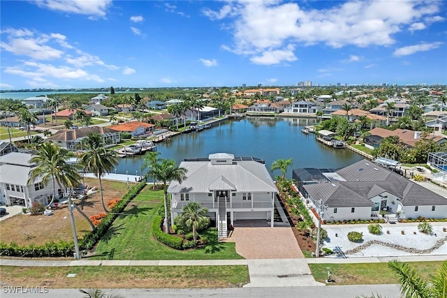 aerial perspective of suburban area featuring a large body of water