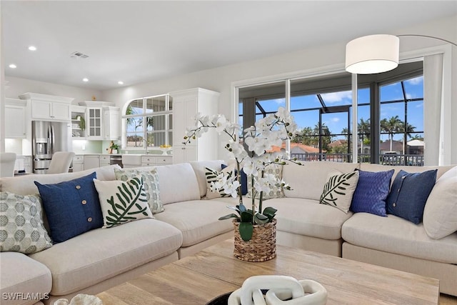 living room featuring recessed lighting