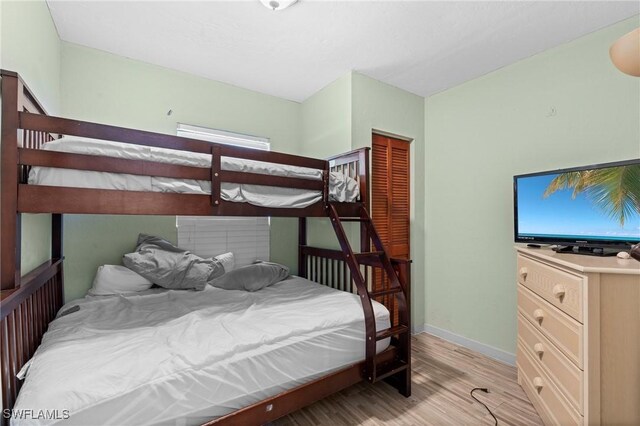210 Miramar St, Fort Myers Beach, FL 33931 - bedroom featuring light wood finished floors