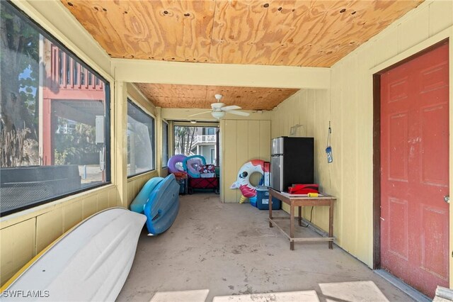 210 Miramar St, Fort Myers Beach, FL 33931 - unfurnished sunroom featuring a ceiling fan