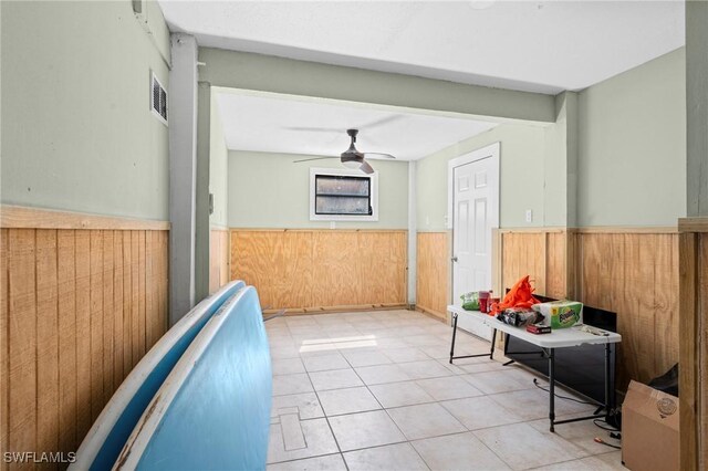 210 Miramar St, Fort Myers Beach, FL 33931 - interior space featuring wooden walls, visible vents, and wainscoting