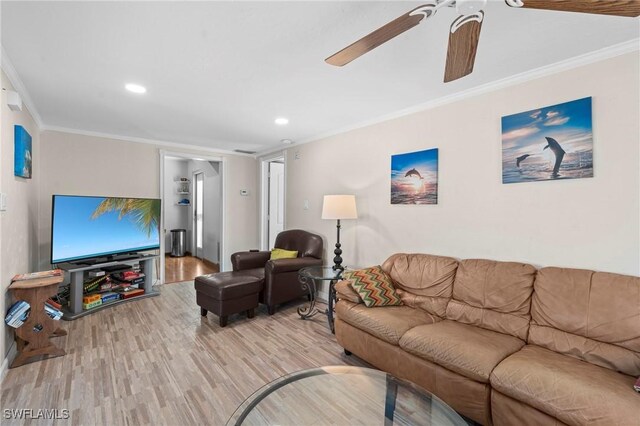 210 Miramar St, Fort Myers Beach, FL 33931 - living area featuring wood finished floors, ceiling fan, crown molding, and recessed lighting