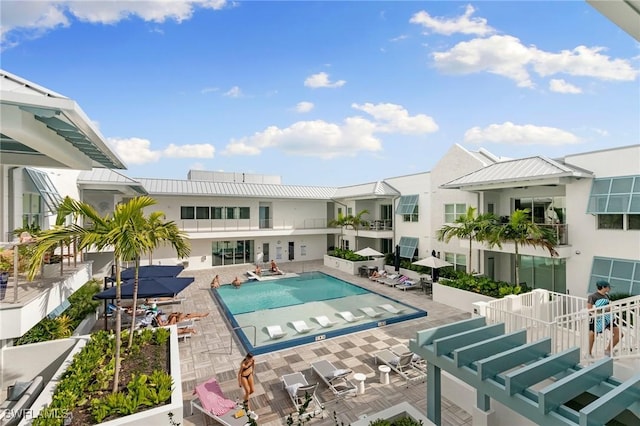 201 8th St S Unit 301, Naples, FL 34102 - community pool with a patio area