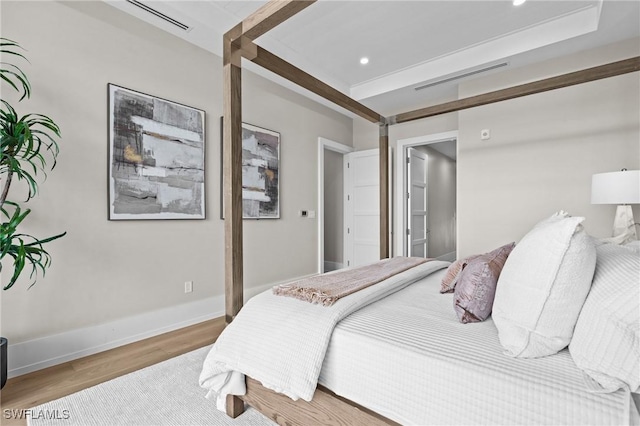 201 8th St S Unit 301, Naples, FL 34102 - bedroom featuring visible vents, wood finished floors, baseboards, and recessed lighting