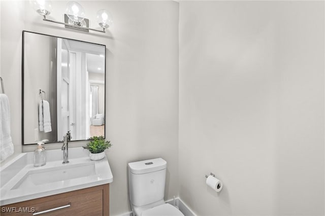 201 8th St S Unit 301, Naples, FL 34102 - bathroom featuring toilet and vanity