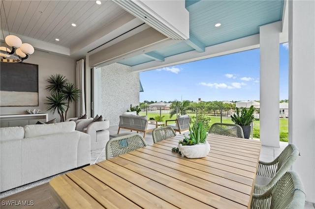 201 8th St S Unit 301, Naples, FL 34102 - wooden terrace featuring an outdoor hangout area
