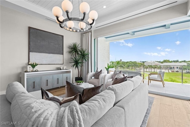 201 8th St S Unit 301, Naples, FL 34102 - living area with a notable chandelier, recessed lighting, wooden ceiling, and wood finished floors