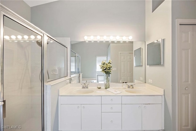 597 Lambton Ln, Naples, FL 34104 - full bath featuring a shower stall, a sink, and double vanity