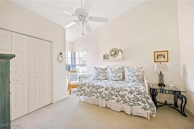 597 Lambton Ln, Naples, FL 34104 - carpeted bedroom featuring ceiling fan, baseboards, lofted ceiling, and a closet