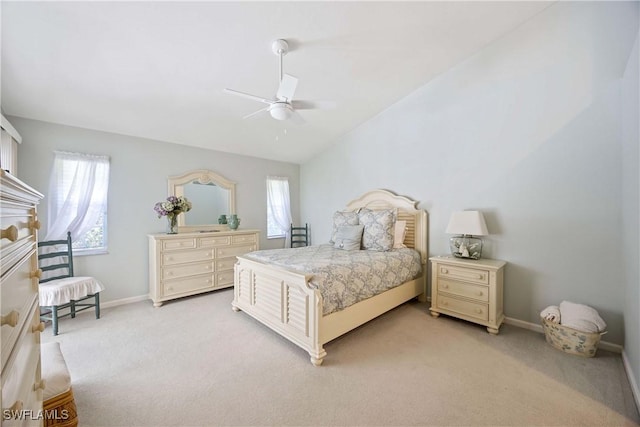 597 Lambton Ln, Naples, FL 34104 - bedroom featuring vaulted ceiling, baseboards, light colored carpet, and a ceiling fan