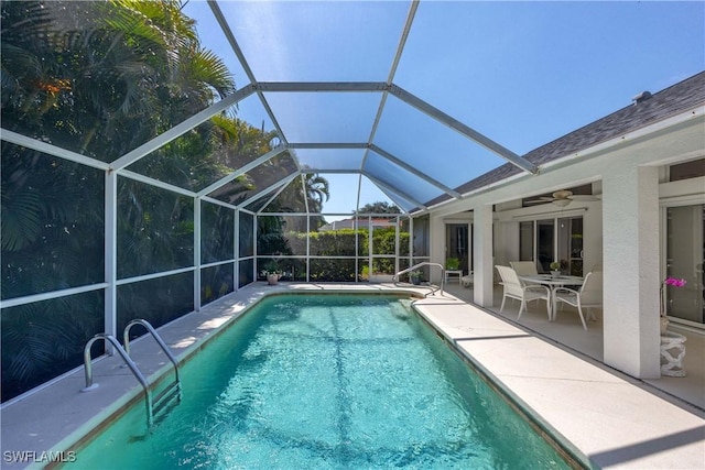 597 Lambton Ln, Naples, FL 34104 - pool featuring a lanai, a patio, and ceiling fan
