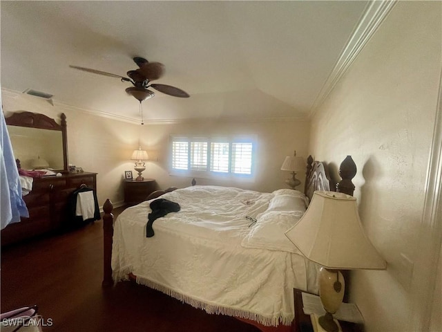 bedroom featuring dark wood-style flooring, visible vents, ceiling fan, and crown molding