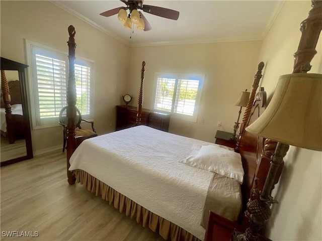 bedroom with a ceiling fan, baseboards, ornamental molding, and light wood-style floors