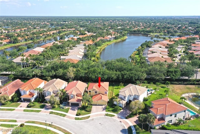 aerial view featuring a residential view and a water view