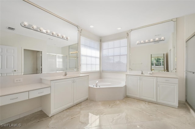 full bathroom with a shower stall, visible vents, a sink, two vanities, and a garden tub