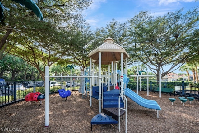 community jungle gym with fence