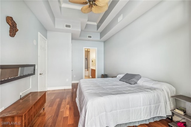 2797 1st St Unit 2003, Fort Myers, FL 33916 - bedroom featuring baseboards, wood finished floors, a tray ceiling, and visible vents