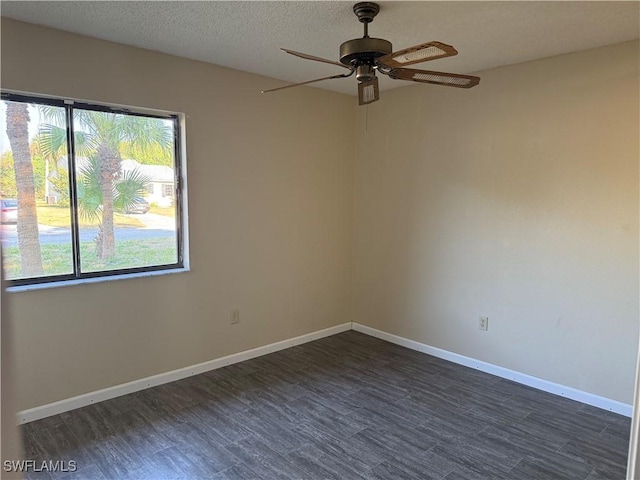 4004 Sena Ln, Labelle, FL 33935 - empty room with baseboards, a ceiling fan, dark wood-style floors, and a textured ceiling