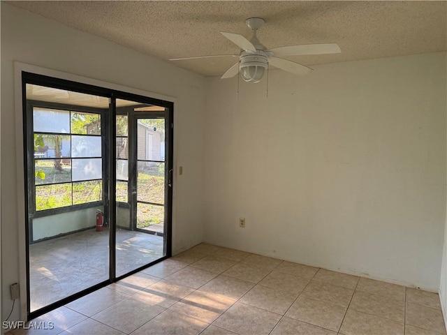 4004 Sena Ln, Labelle, FL 33935 - unfurnished room featuring light tile patterned floors, a textured ceiling, and ceiling fan