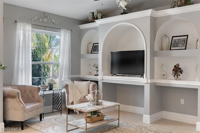 2748 45th Ave NE, Naples, FL 34120 - living area featuring tile patterned flooring, built in features, and baseboards