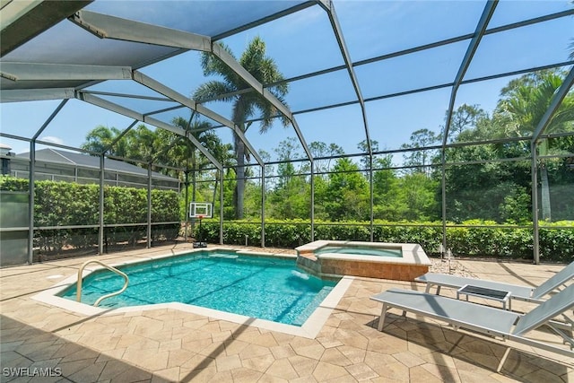 view of swimming pool featuring a lanai, a patio, and a pool with connected hot tub