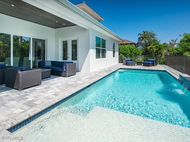 201 S Heathwood Dr, Marco Island, FL 34145 - view of pool with fence, a patio area, an outdoor hangout area, and a fenced in pool