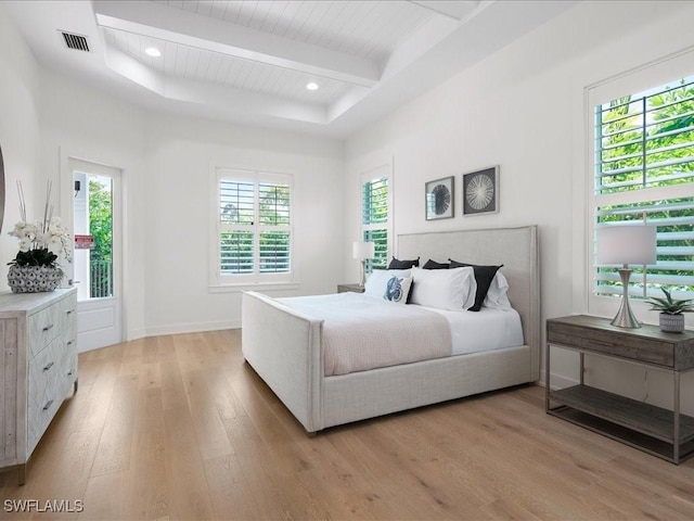 201 S Heathwood Dr, Marco Island, FL 34145 - bedroom with beamed ceiling, light wood-type flooring, wood ceiling, and multiple windows