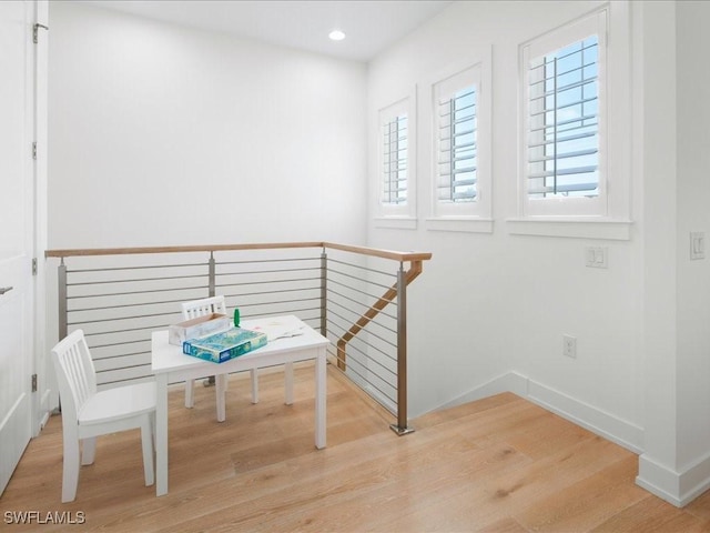 201 S Heathwood Dr, Marco Island, FL 34145 - interior space featuring recessed lighting, wood finished floors, baseboards, and an upstairs landing