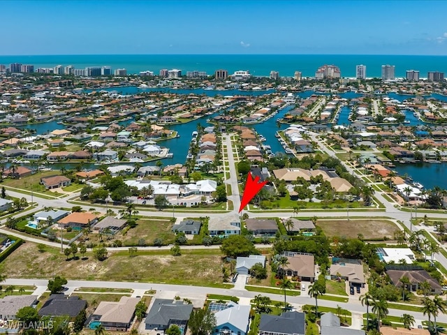 201 S Heathwood Dr, Marco Island, FL 34145 - bird's eye view with a residential view, a water view, and a view of city