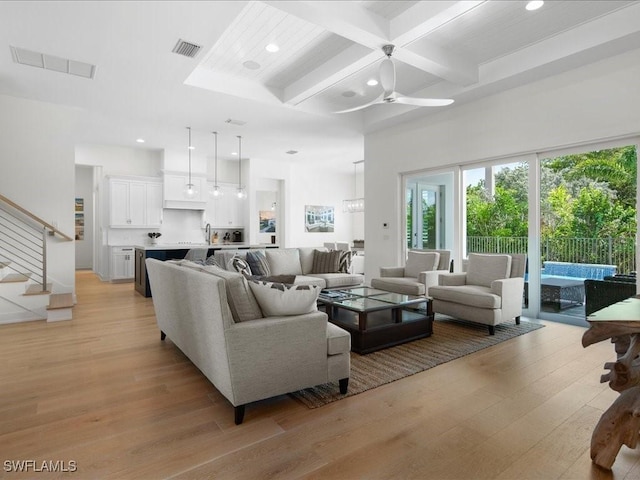 201 S Heathwood Dr, Marco Island, FL 34145 - living area with ceiling fan, beam ceiling, light wood-style floors, and recessed lighting