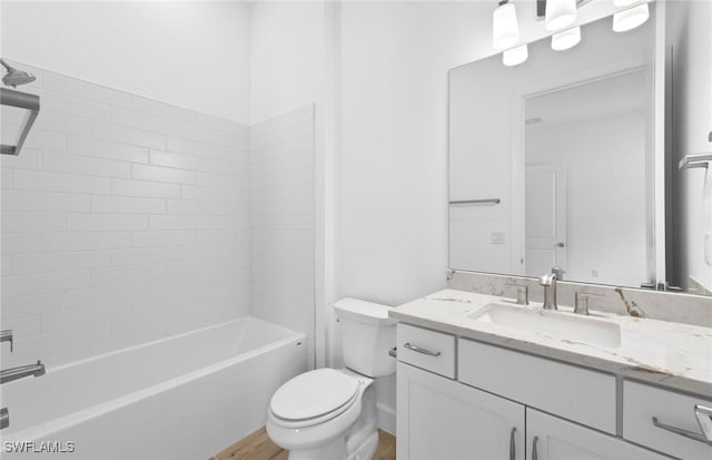 full bathroom with vanity, shower / bathtub combination, wood finished floors, and toilet