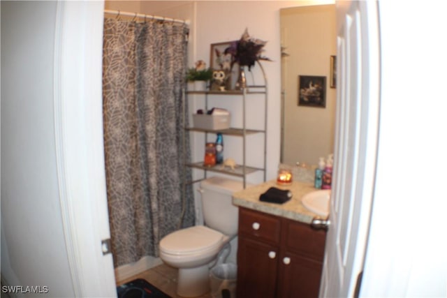 509 SW 28th St, Cape Coral, FL 33914 - full bathroom featuring curtained shower, toilet, and vanity