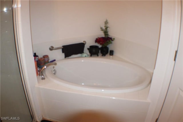 509 SW 28th St, Cape Coral, FL 33914 - bathroom featuring a shower with shower door and a bath