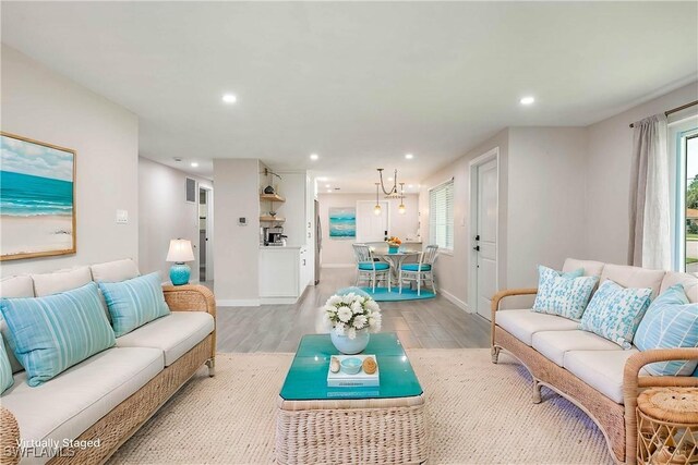 27525 Michigan St, Bonita Springs, FL 34135 - living room featuring light wood-style flooring, baseboards, and recessed lighting