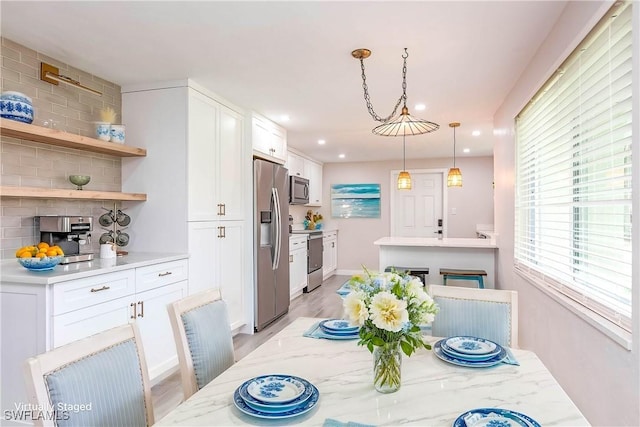 27525 Michigan St, Bonita Springs, FL 34135 - dining room with recessed lighting and light wood-type flooring